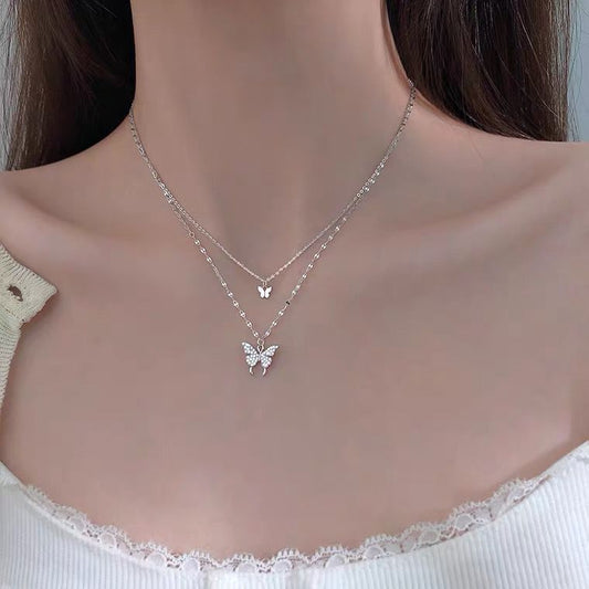 Alina - Raffiniertes Silberhalsketten-Set mit glänzendem Schmetterling