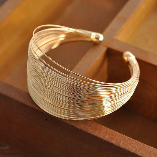 Xenia - Gold mehrsträngiger Armreif